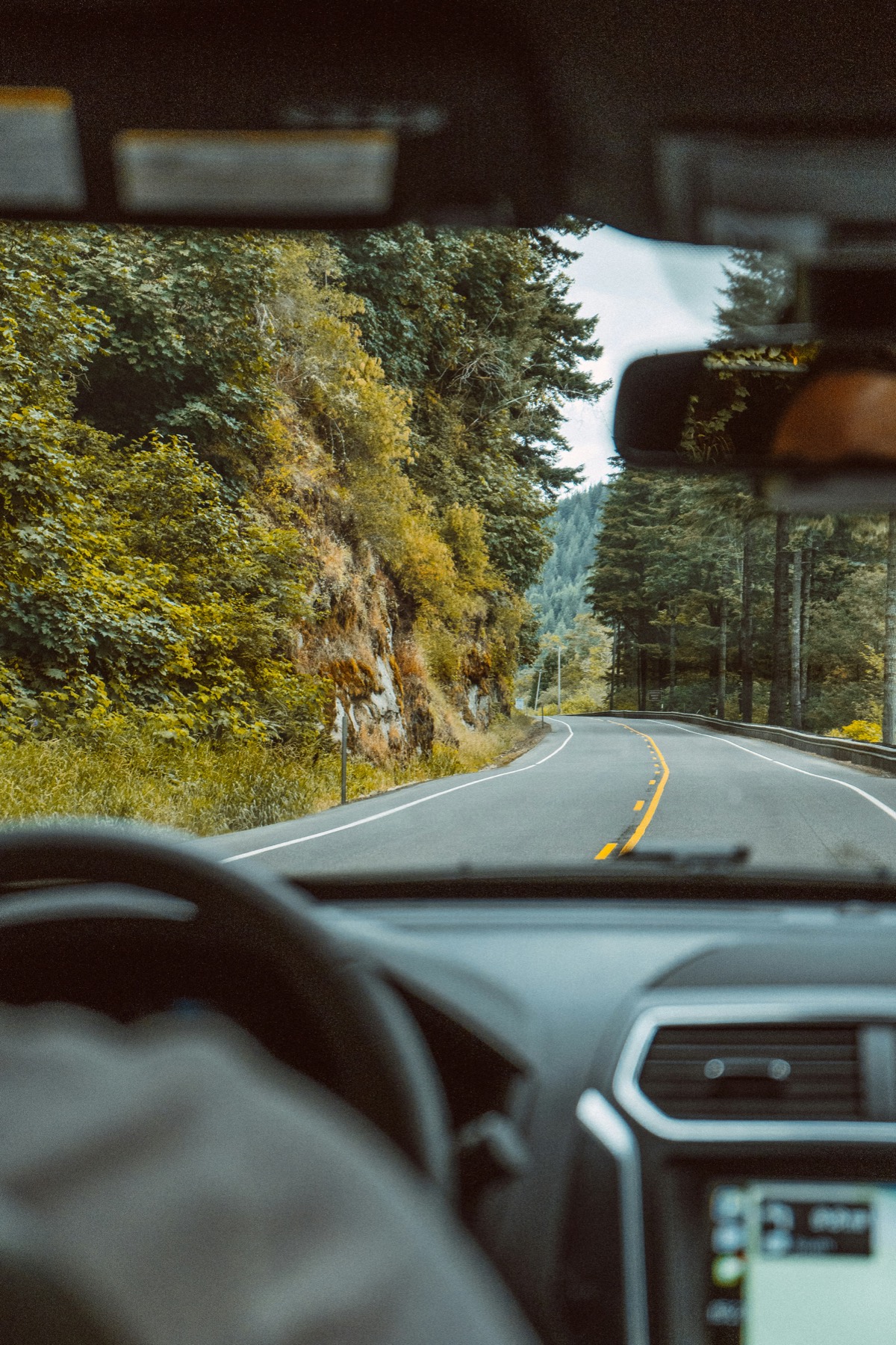 The open road ahead through the windscreen